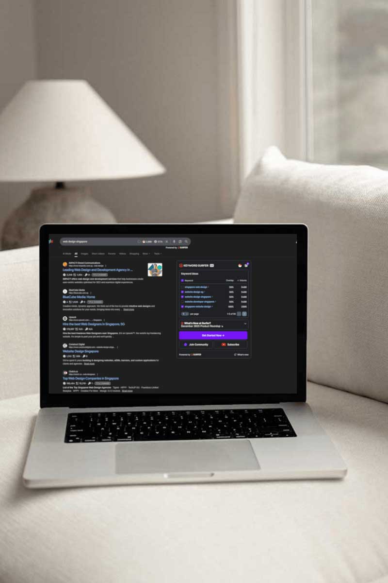small business SEO content planning on laptop in minimal workspace